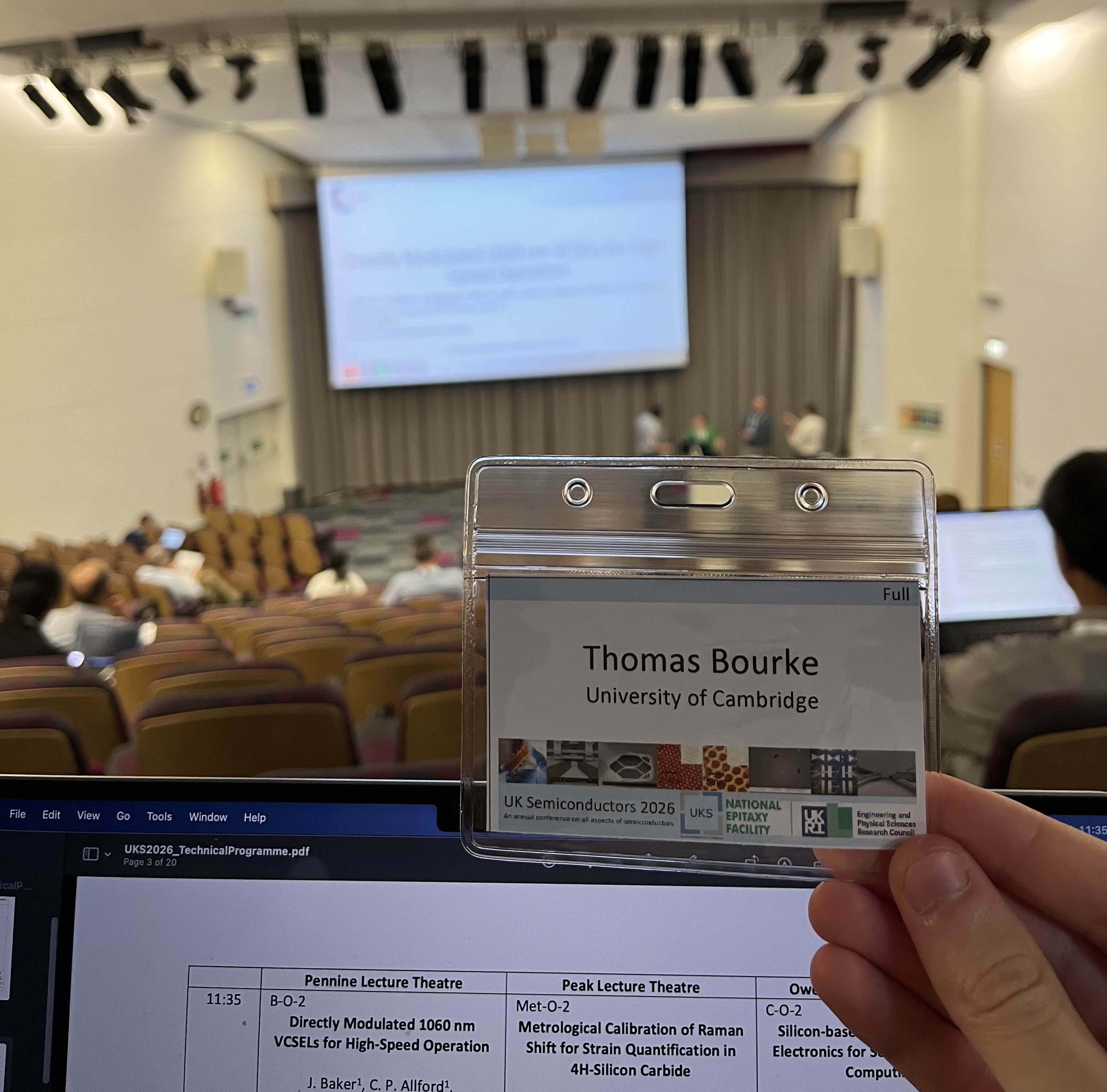 Badge photo from first plenary talk.